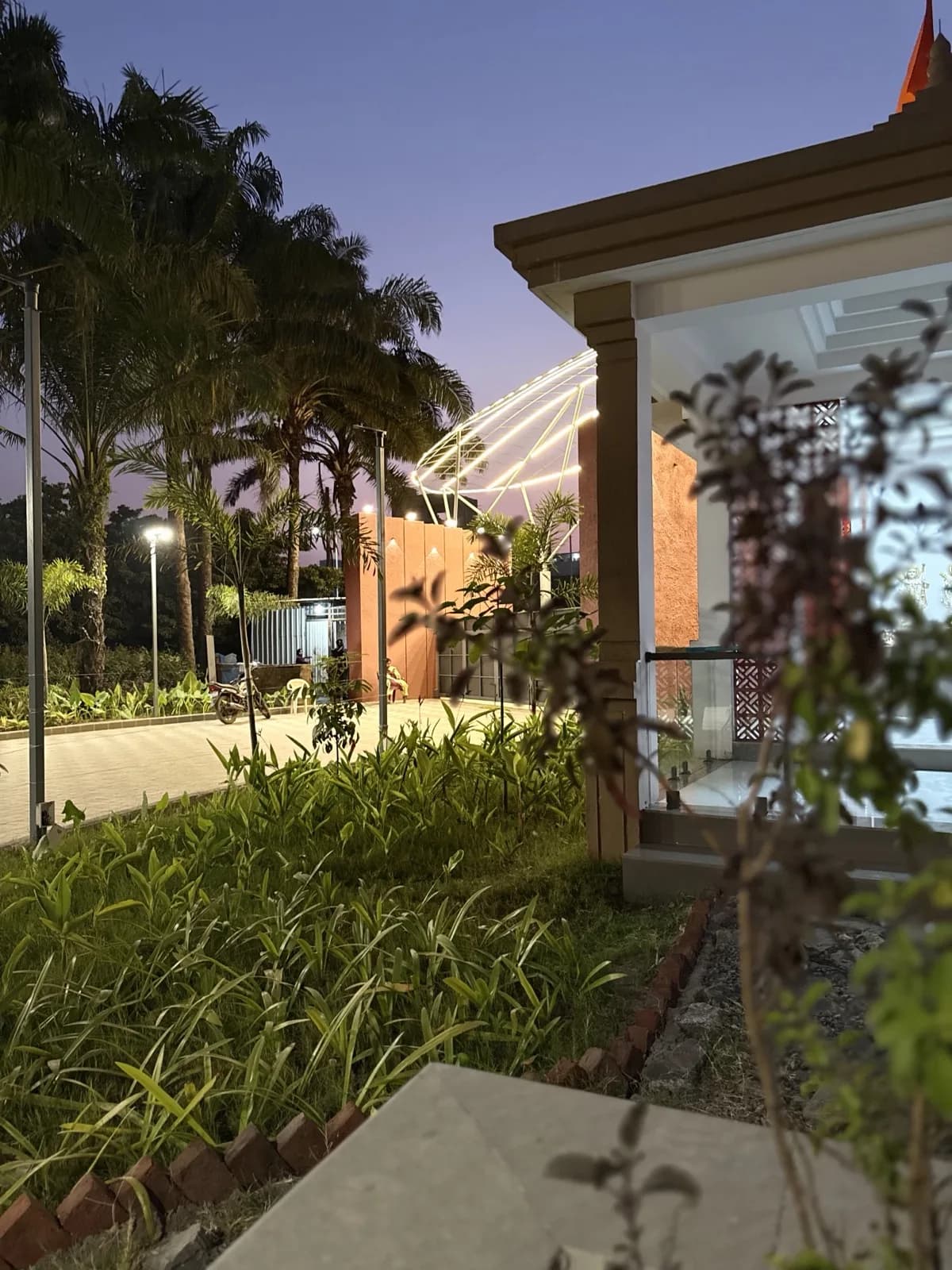 The property at evening, lit for a function